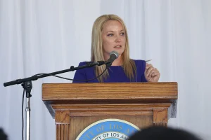 speaker at the podium at the 2019 John Anson awards ceremony.