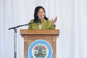 speaker at the podium at the 2019 John Anson awards ceremony.