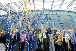Supervisor Solis group photo with ribbon celebration