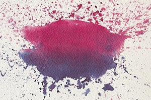 Farbklecks aus Wasserfarbe Lila Pink auf weißem Hintergrund