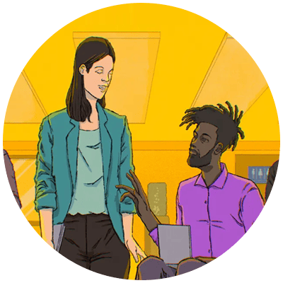 woman talking to man in wheelchair holding a laptop to symbolize one of the top leadership articles of 2023