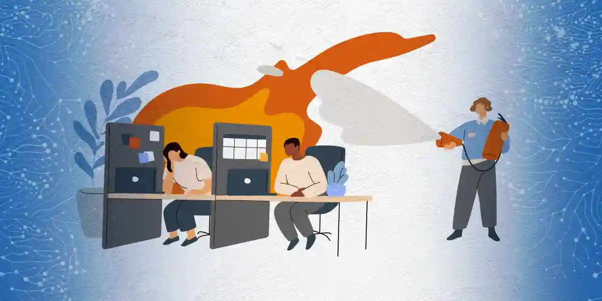 Two people in cubicles with flames behind them because they are feeling burn out. A person to the side is trying to extinguish the flames.