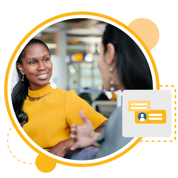 two professional women engaged in a one-on-one executive coaching conversation?fm=webp&q=65