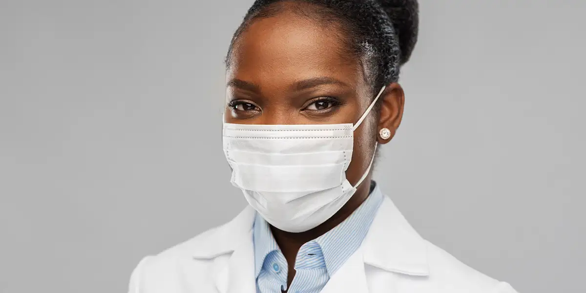 African American woman doctor, representing part of a leadership program designed to close the leadership gender gap 