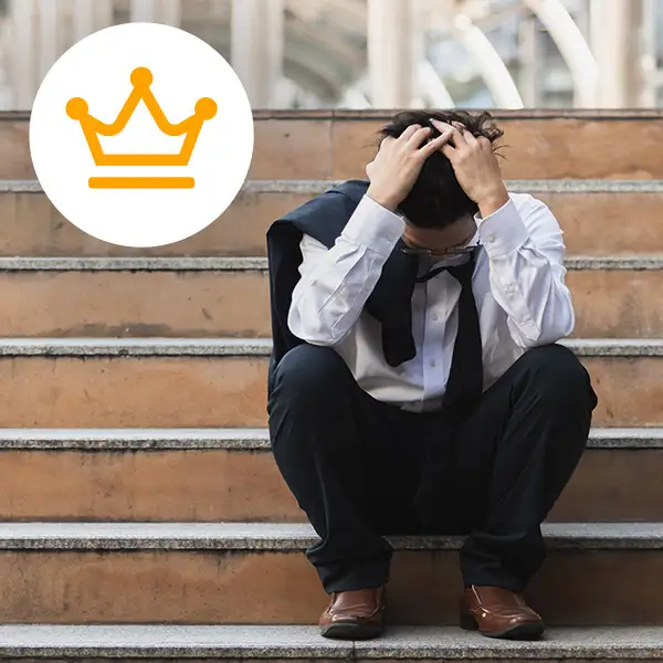 Man sitting on step upset?fm=webp&q=65