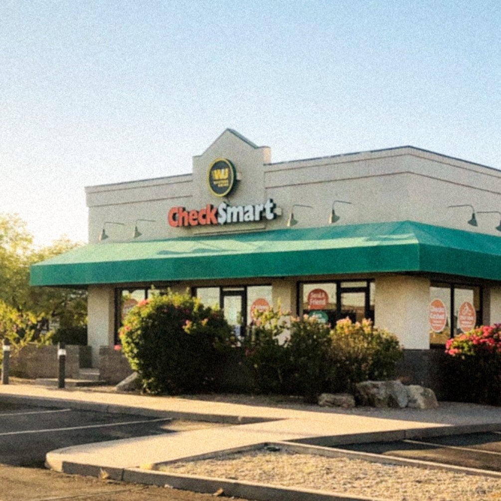 Sitting ready to service customers walking in the door or using CheckSmart website.