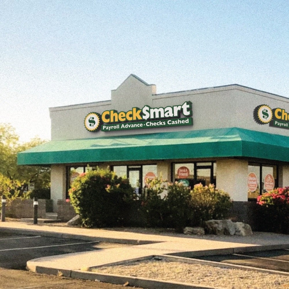 Sitting ready to service customers walking in the door or using CheckSmart website.