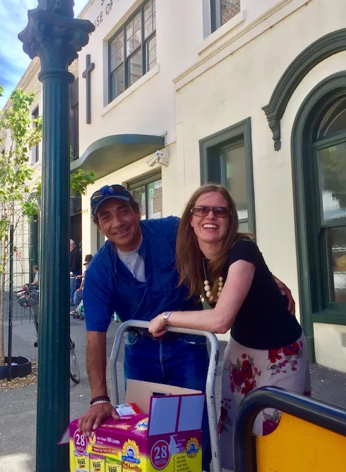 Tami delivering boxes to St Mary's