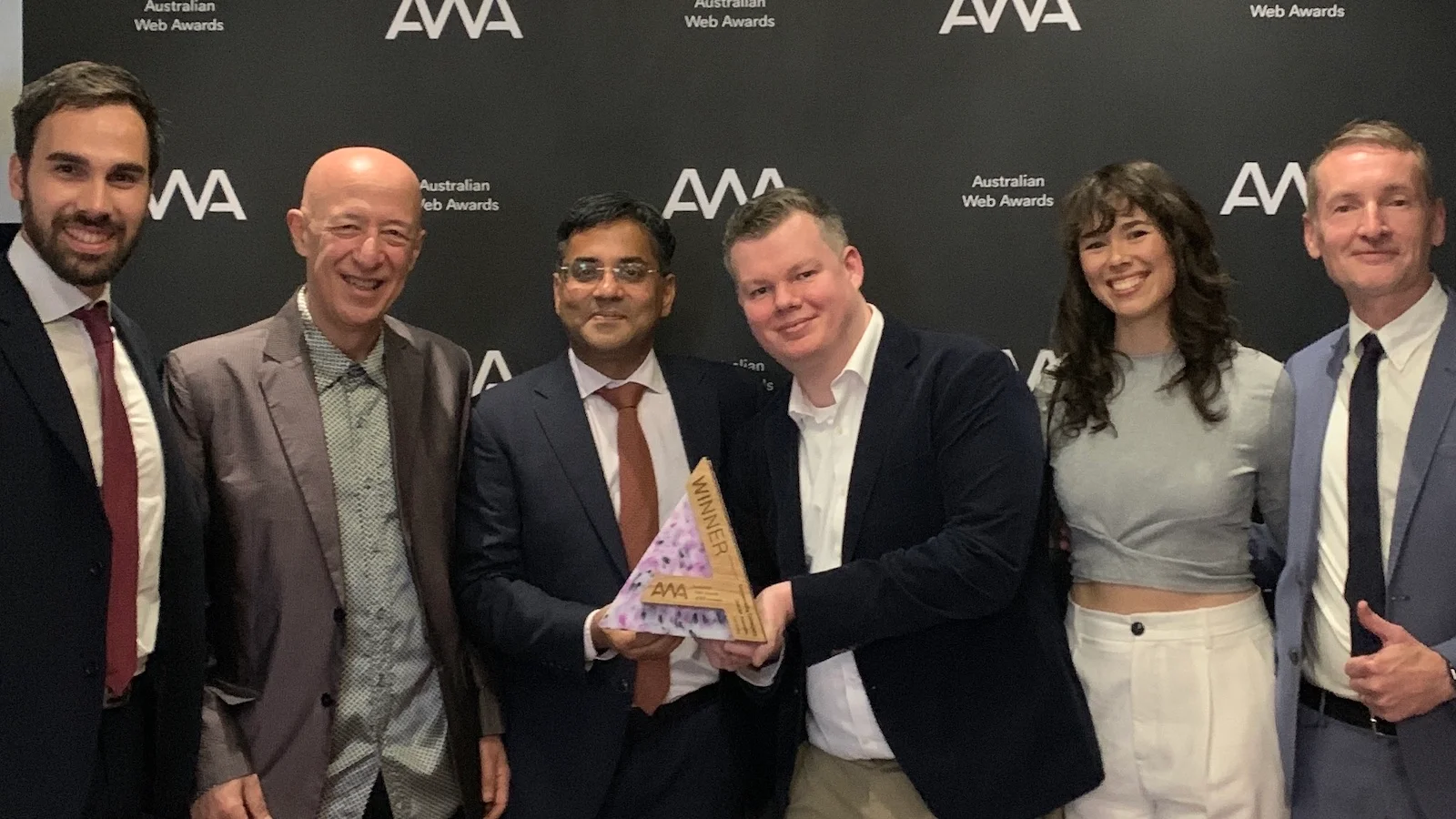 Unicef and Luminary accepting the AWA McFarlane Award for Excellence