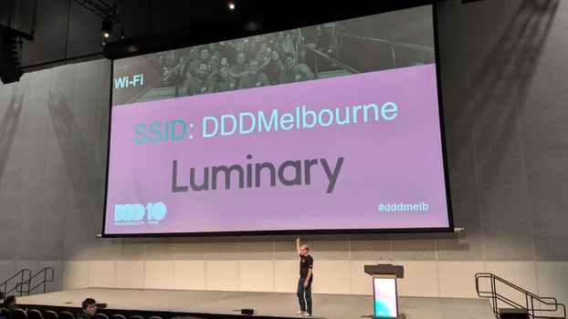 DDD Melbourne stage with Luminary slide as backdrop