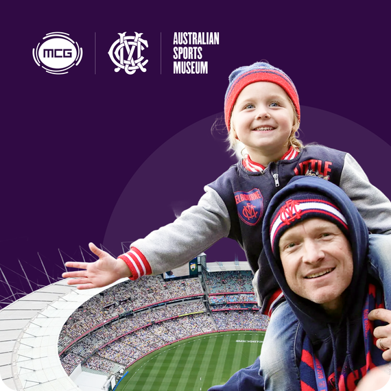 A dad and kid at MCG