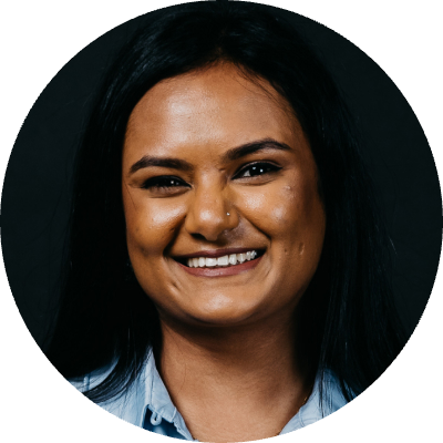 Picture of Renu Gudlawar against a black background