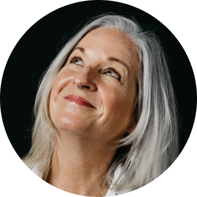 Picture of Lisa standing against a black background