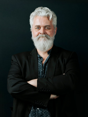 Picture of Nathan Cocks, against a black background