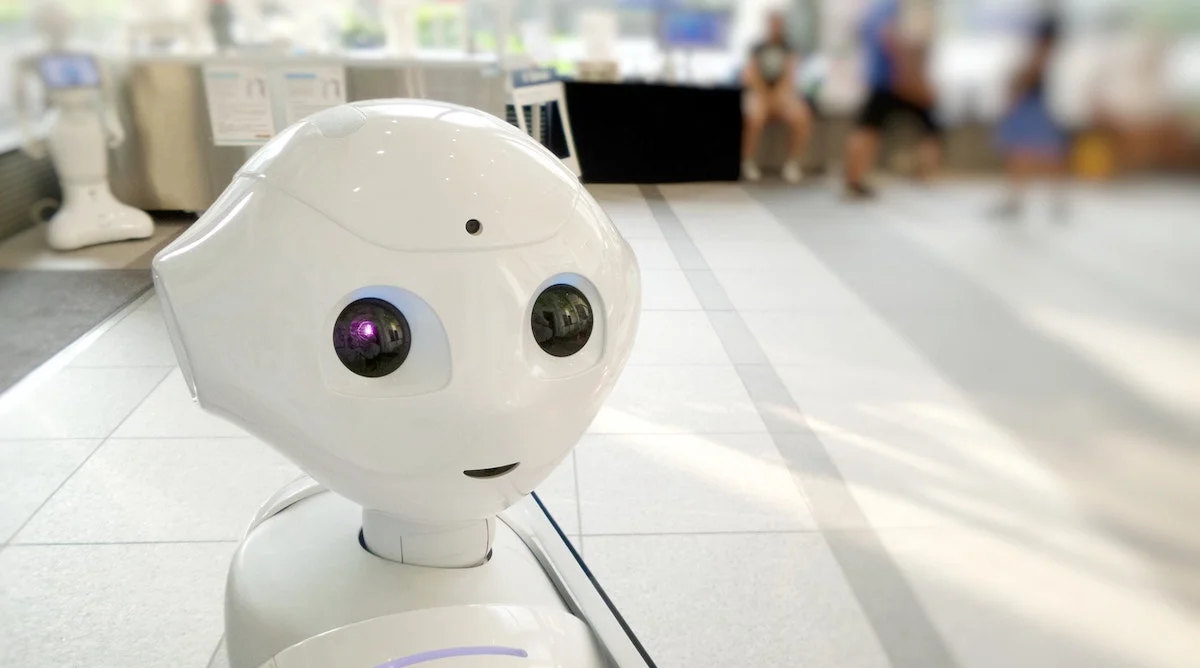 Picture of an AI robot looking over their shoulder depicting the AI content machine