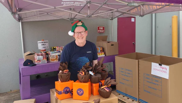 Marty at Foodbank with puddings