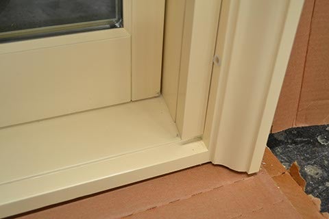 CS37-3, Double Hung with Simulated Segment Head & Custom Casing (exterior sill closeup)