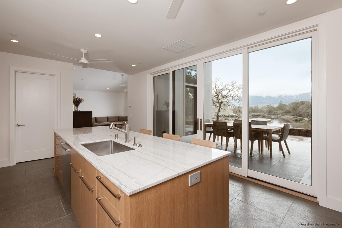 AM231 - Kolbe VistaLuxe WD sliding patio door featured in guest house kitchen