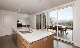 AM231 - Kolbe VistaLuxe WD sliding patio door featured in guest house kitchen