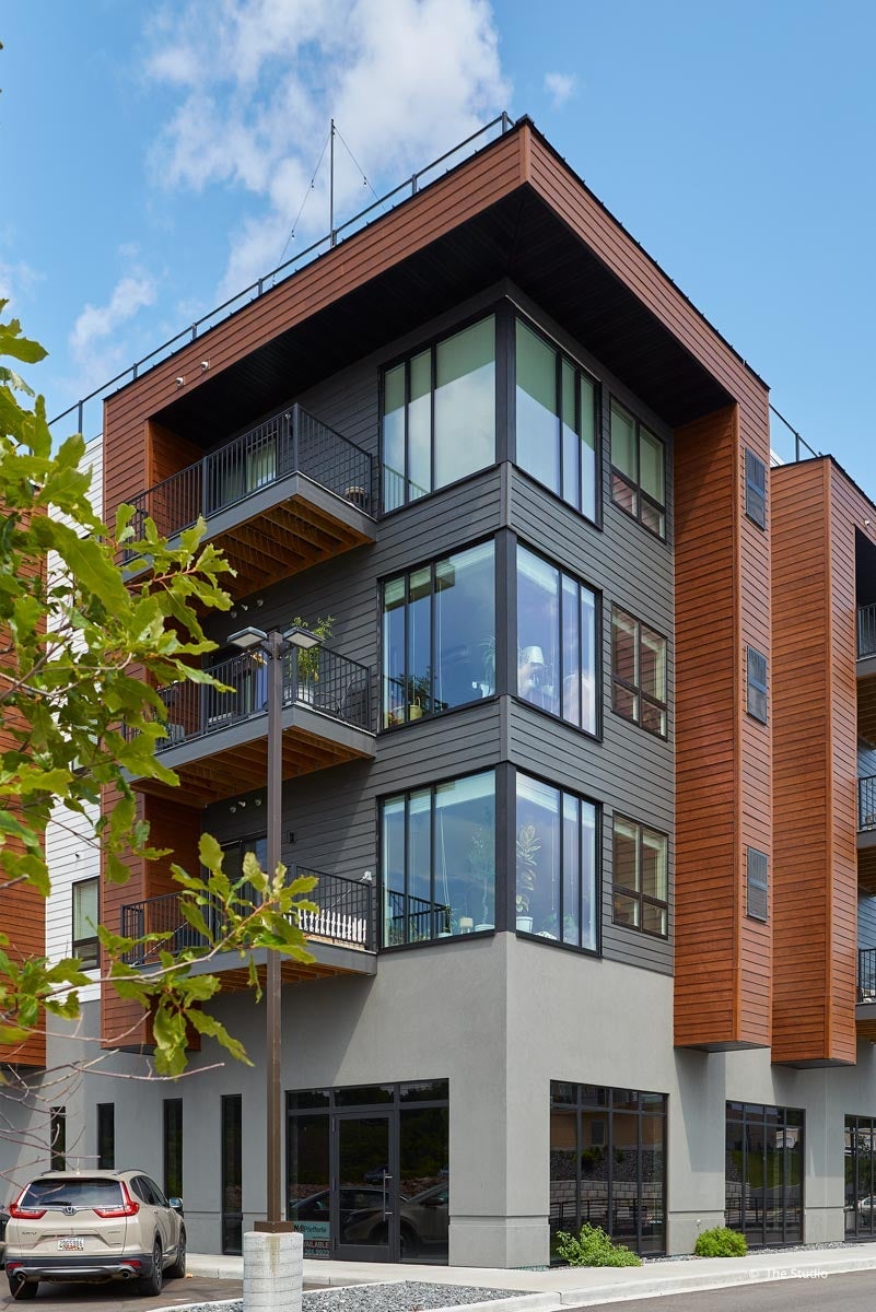 AO929 - Exterior of commercial building with VistaLuxe AL and Forgent windows and doors