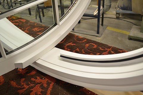 CS56-12, Pivoting Oval Window (exterior closeup of weather strip & stop)
