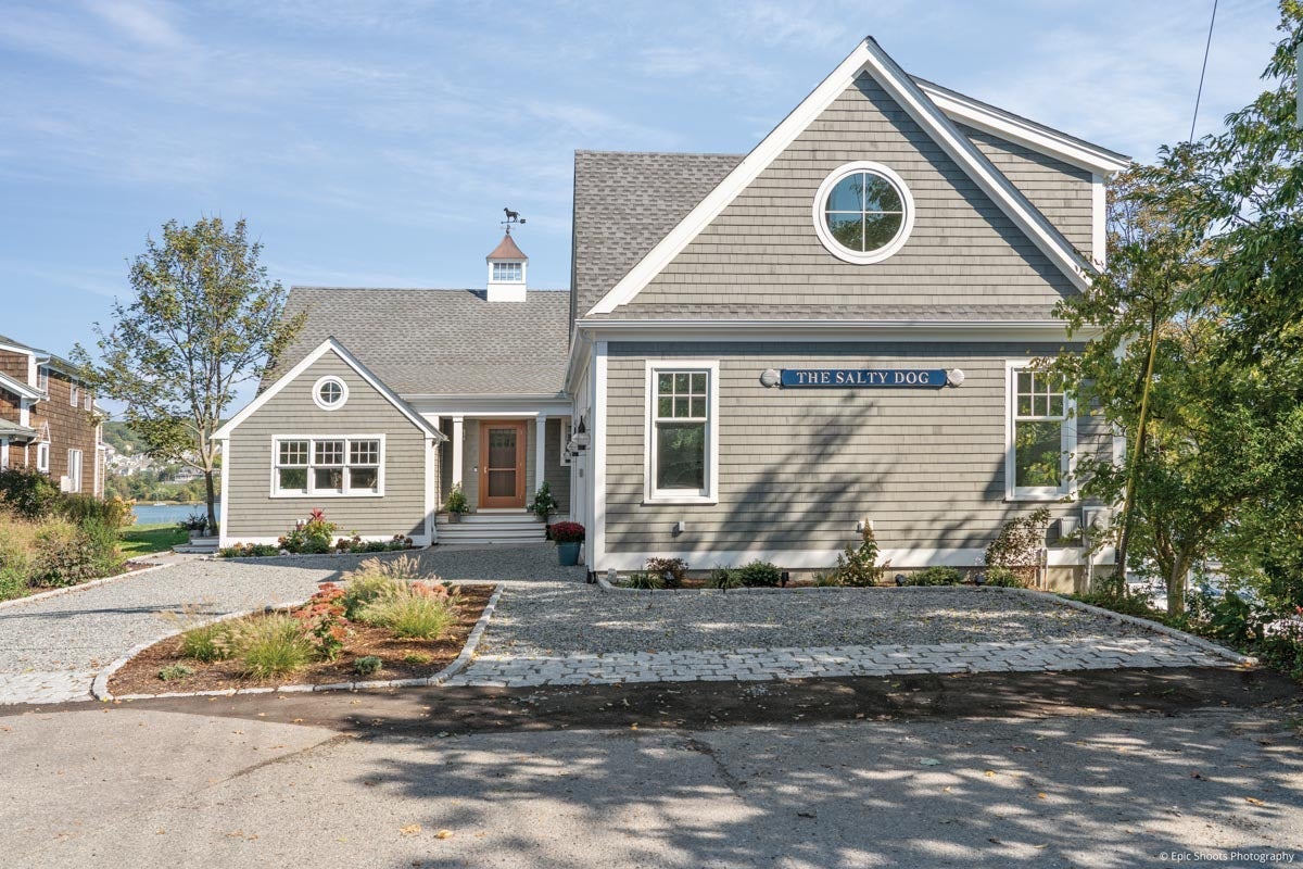 AM700 - front of house with Ultra series double hung and radius windows