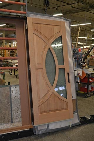 CS50-1, Mahogany French Door with Custom Raised Panels & Rain Glass (exterior)