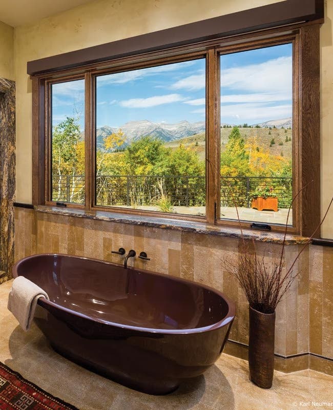 VistaLuxe Collection casement picture window with center stationary unit and operational flankers