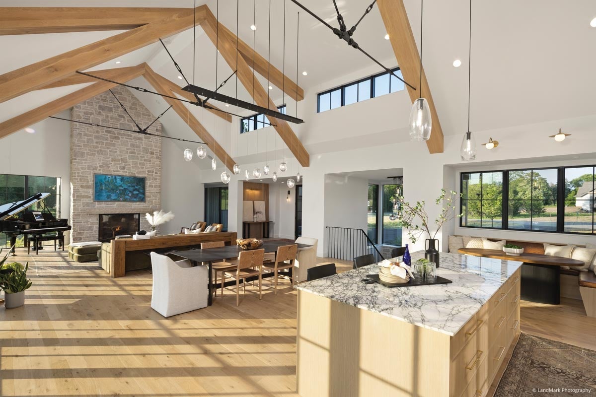 AN321 - living room with high ceilings and wood beams; VistaLuxe Collection windows and doors