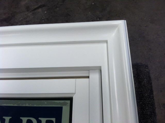CS46-5, Double Hung with Custom Casing and Sill (exterior top corner)
