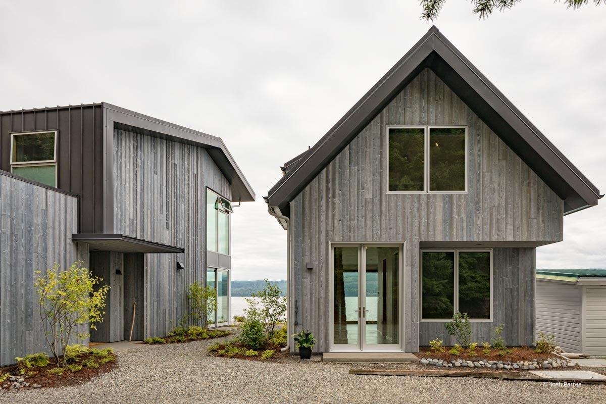 AO400 – Exterior of waterfront home with VistaLuxe windows and doors