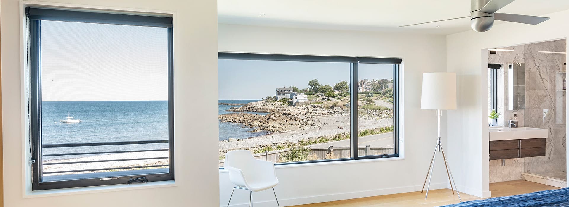 Impact Performance Windows looking out onto an ocean view. VistaLuxe WD LINE