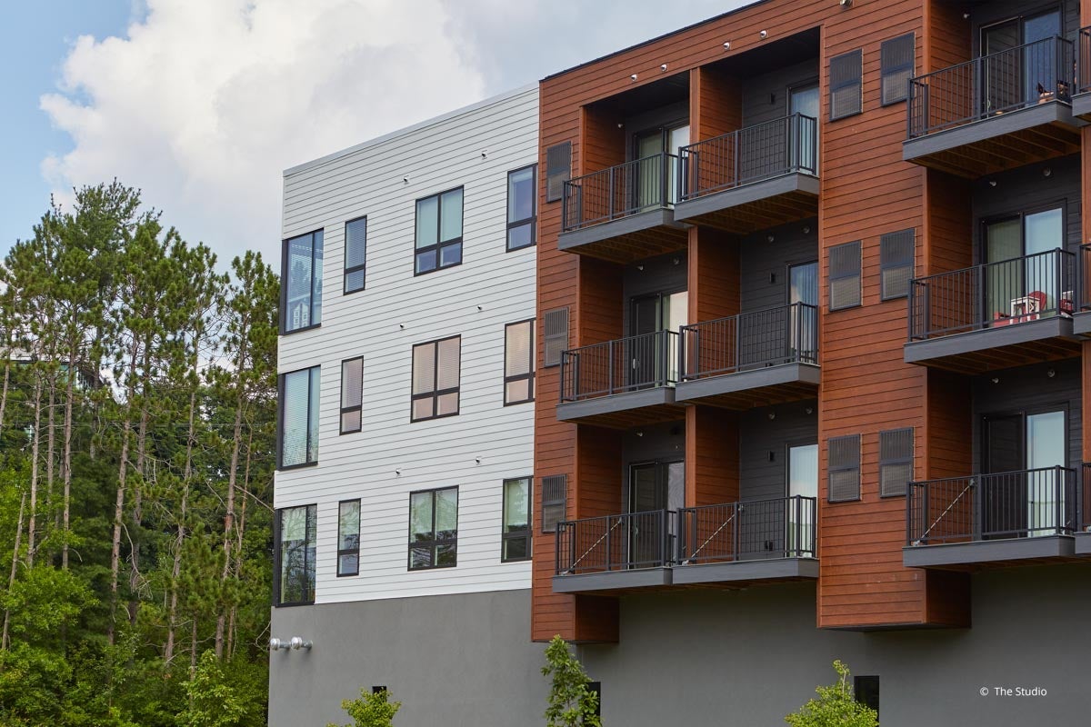 AO919 - Exterior of commercial building with VistaLuxe AL and Forgent windows and doors