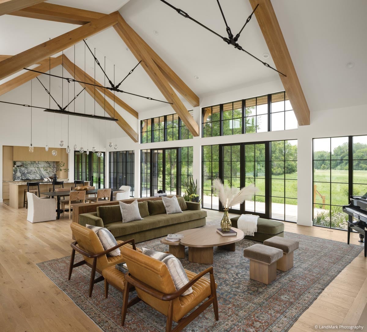 AN320 - living room with high ceilings and wood beams; VistaLuxe Collection windows and doors
