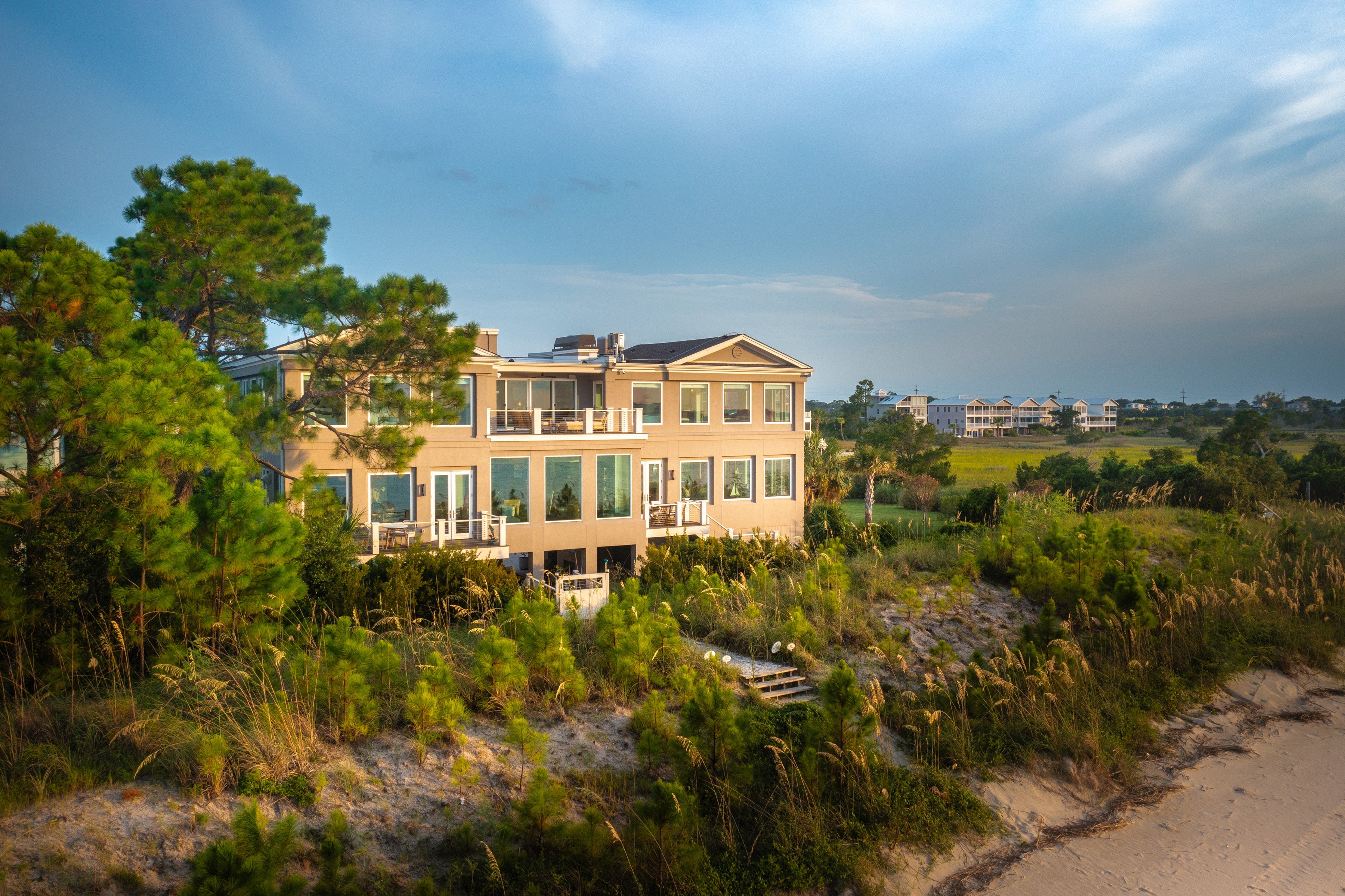 AN500 - Front of waterfront home with Ultra windows and doors