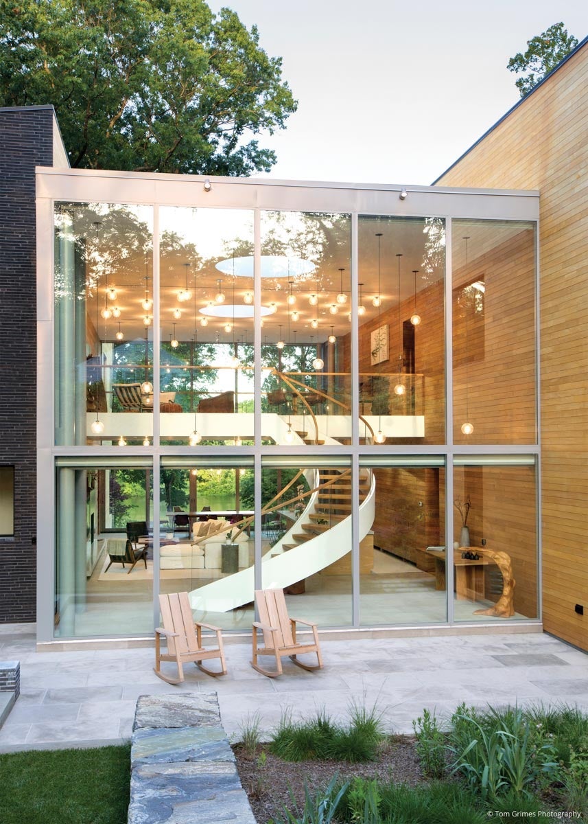 AN101 - exterior view of a two story residential glass wall