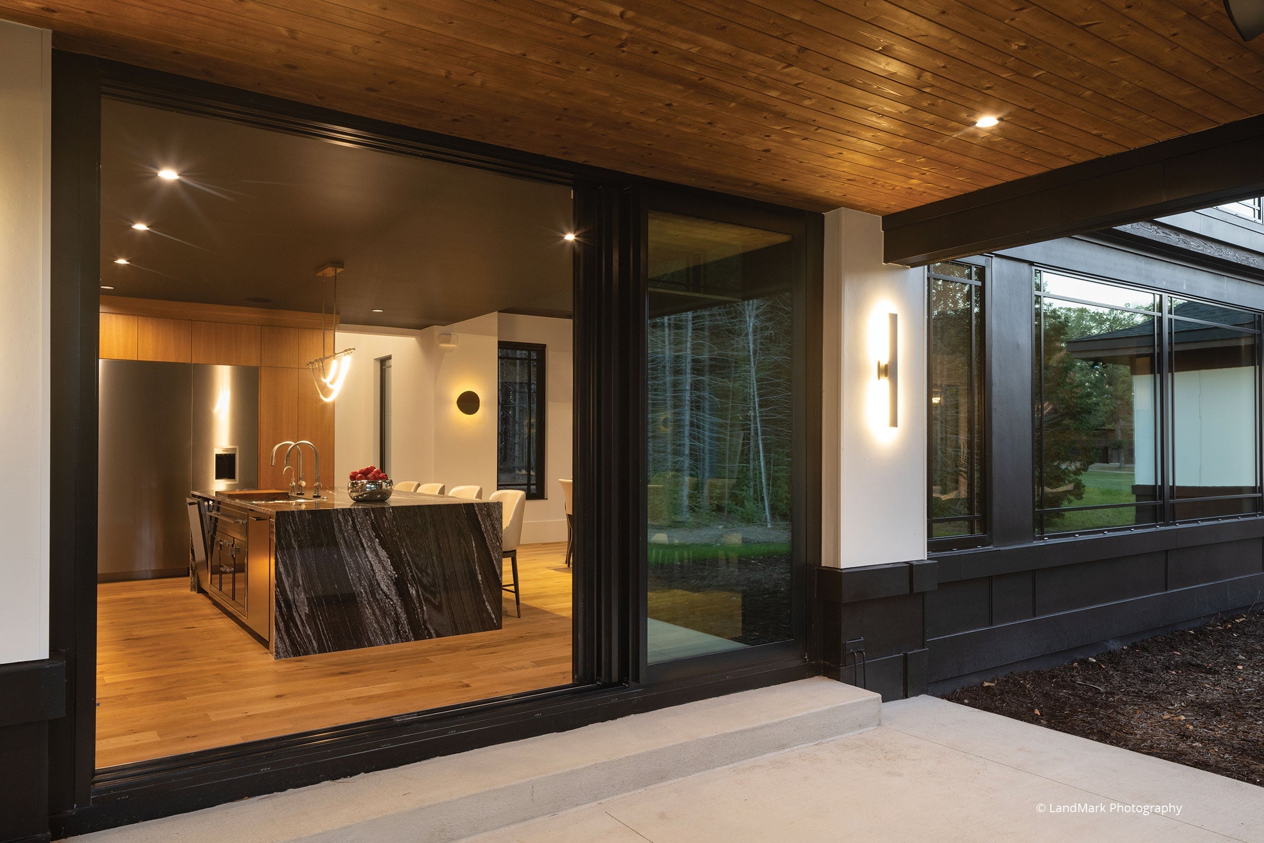 AN835 - Exterior of contemporary home with VistaLuxe lift & slide door