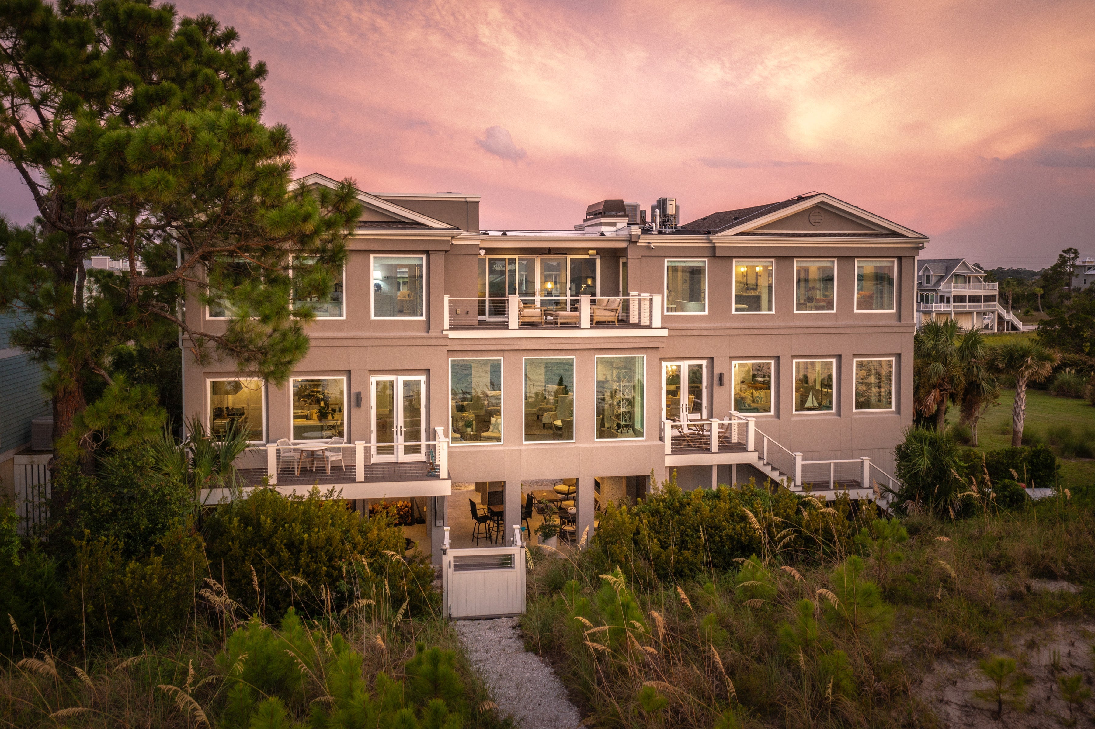 AN509 – Exterior of waterfront home with Ultra windows and doors