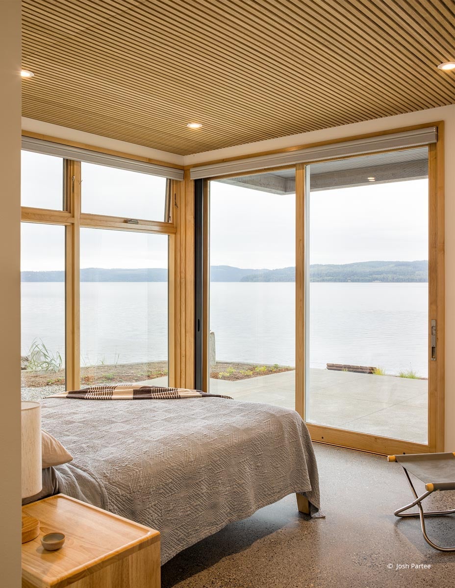AO404 – Interior of waterfront home with VistaLuxe windows and doors