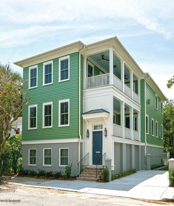 on the left: white large double hung windows