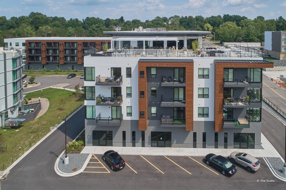 AO935 - Exterior of commercial building with VistaLuxe AL and Forgent windows and doors