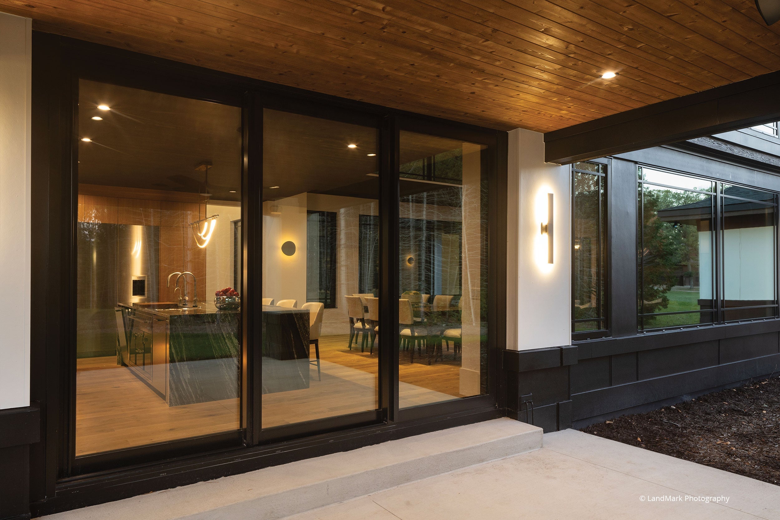 AN834 - Exterior of contemporary home with VistaLuxe lift & slide door