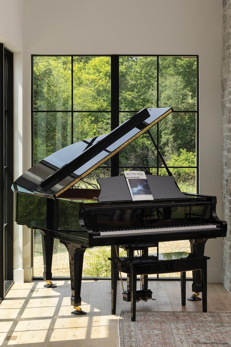 AN318 - piano in front of VistaLuxe Collection windows