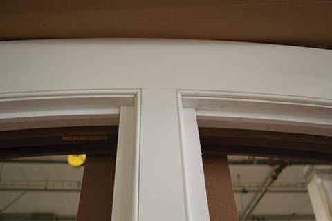 CS11-02, Segment Head Double Hung with Custom Casing (exterior top)