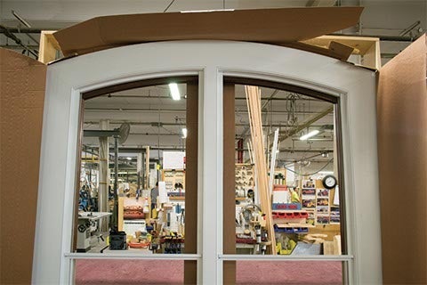 CS11-03, Segment Head Double Hung with Custom Casing (exterior top sash)