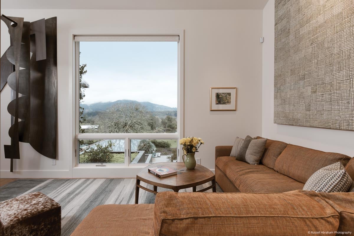 AM219 - Kolbe VistaLuxe WD large picture window mulled to two awnings featured in family room