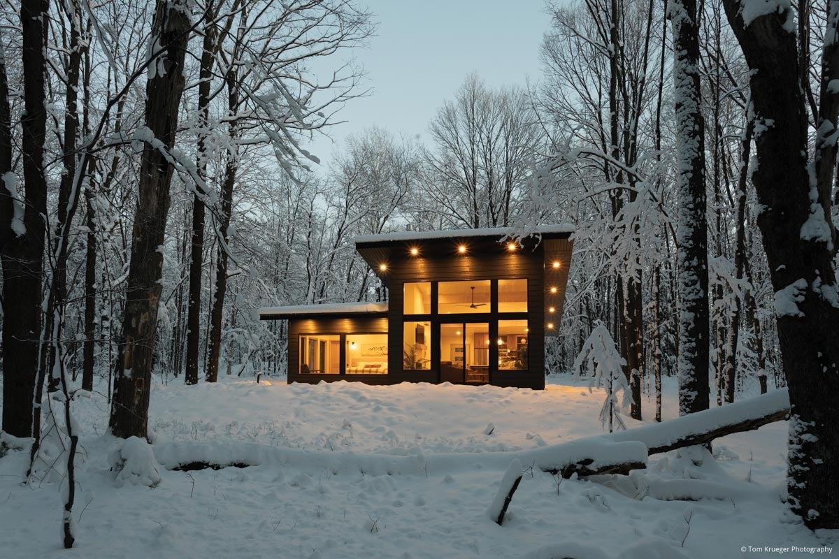 AM300 - exterior of home with floor to ceiling direct set windows and sliding patio door