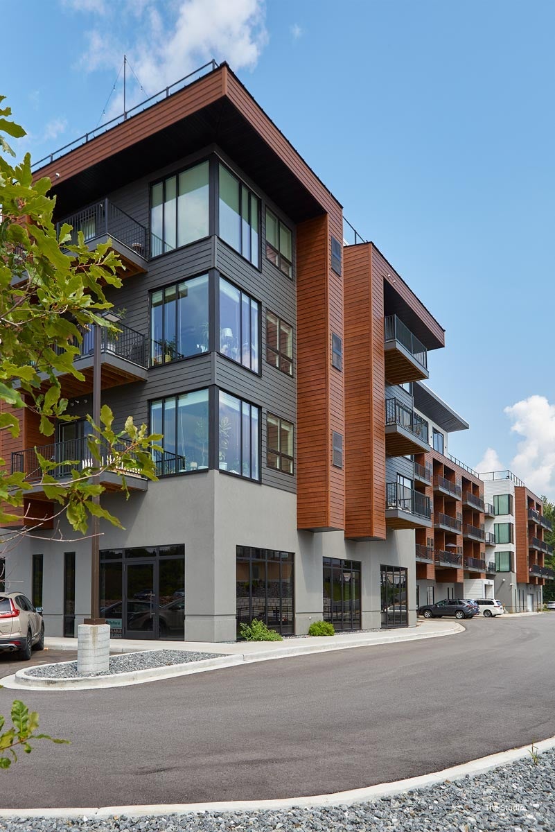 AO930 - Exterior of commercial building with VistaLuxe AL and Forgent windows and doors