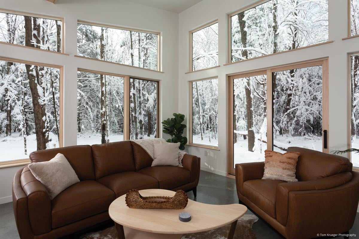 AM306 - Kolbe VistaLuxe WD casements, geometric direct sets and sliding patio door featured in living room