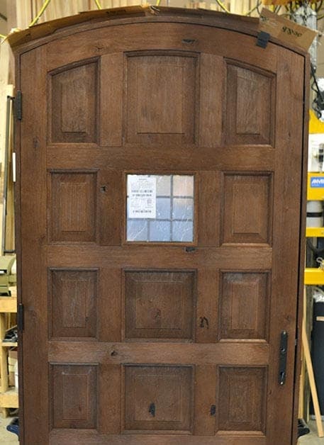 Radius-Top Knotty Alder Door with Wire-Brushed Finish